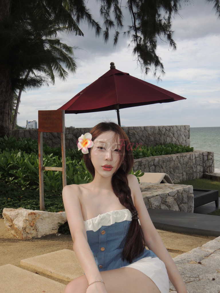 ภาพของ Fhafez fiwfan สาวรับงาน สุขุมวิท นั่งริมทะเลในชุดเดนิมพร้อมดอกไม้ประดับผม