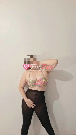 An older woman turns on the camera. - Sideline photo 3